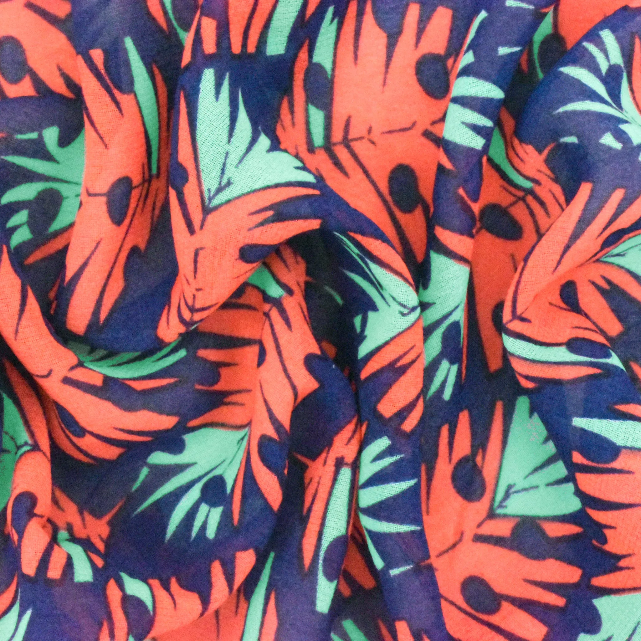 Ink Blue-Orange-Teal Leaves Printed Poly Chiffon Woven Fabric